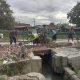 Petani di Dusun Pasar, Desa Kampungsawah, Kecamatan Jayakerta, Kabupaten Karawang, melakukan perbaikan pintu air secara swadaya