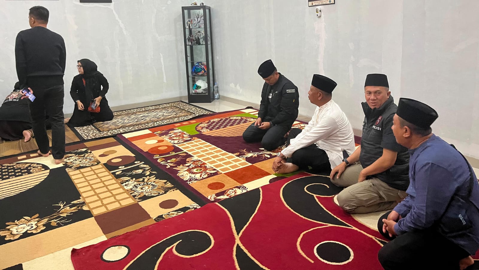 Melayat