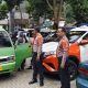 PAM OBVIT Sat Samapta Polres Tasikmalaya Kota patroli objek wisata saat libur sekolah. Amankan taman kota, stasiun, pasar. Liburan aman dan nyaman di Tasik